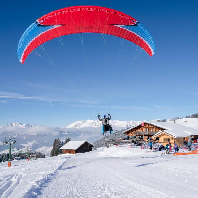 Paragliding above the ski slopes