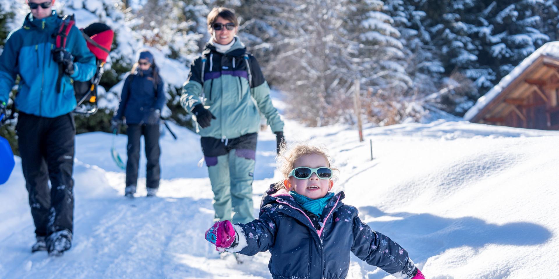 Family outing in the snow