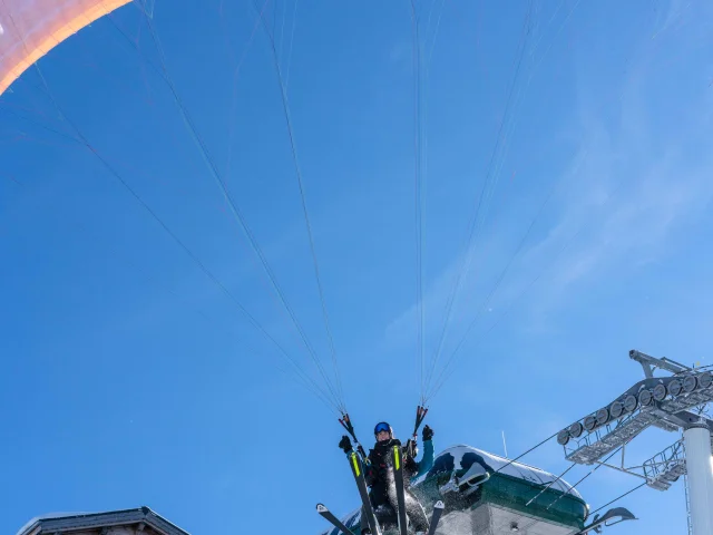 Paragliding above the ski slopes