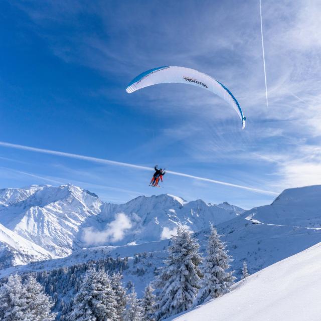 Paragliding above the ski slopes