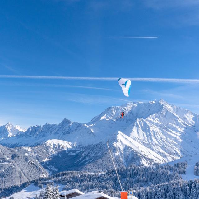 Paragliding above the ski slopes